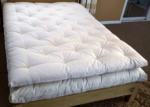 wool mattress topper (topper is on top)
