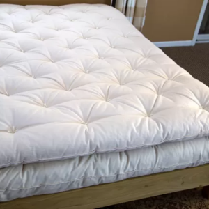wool mattress topper (topper is on top)